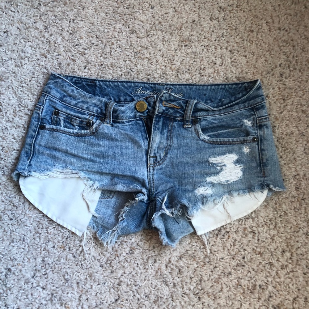 Distressed denim jean shorts